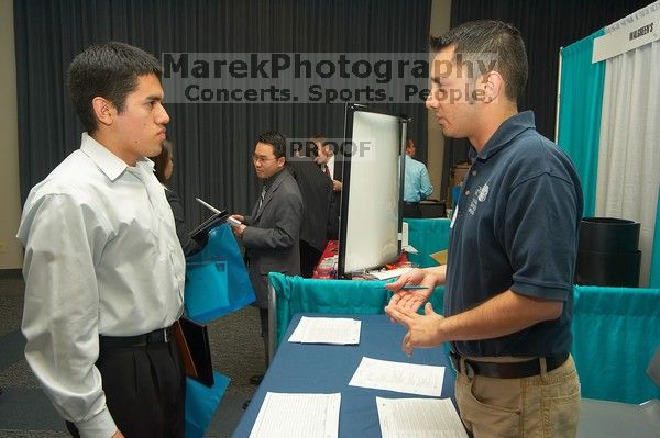 The Asian Business Students Association (ABSA) and the Hispanic Business Student Association (HBSA) hosted the career fair in the San Jacinto Residence Hall, Tuesday, February 6, 2007.

Filename: SRM_20070206_1834325.jpg
Aperture: f/7.1
Shutter Speed: 1/125
Body: Canon EOS-1D Mark II
Lens: Sigma 15-30mm f/3.5-4.5 EX Aspherical DG DF