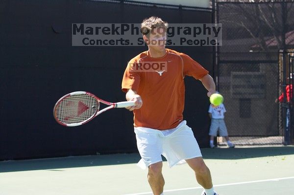 Luis Diaz Barriga and Bernhard Deussner.  The University of Texas (UT) men's tennis team defeated Georgia Tech (GT) Saturday, February 24, 2007..

Filename: SRM_20070224_1329420.jpg
Aperture: f/4.5
Shutter Speed: 1/800
Body: Canon EOS-1D Mark II
Lens: Canon EF 80-200mm f/2.8 L