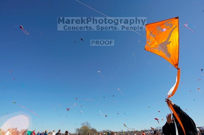 Madhav Tadikonda, class of 1997, and Anjali Patel, class of 1999, fly a UT kite at the 79th annual Zilker Park Kite Festival, Sunday, March 4, 2007.

Filename: SRM_20070304_1537343.jpg
Aperture: f/11.0
Shutter Speed: 1/250
Body: Canon EOS-1D Mark II
Lens: Sigma 15-30mm f/3.5-4.5 EX Aspherical DG DF