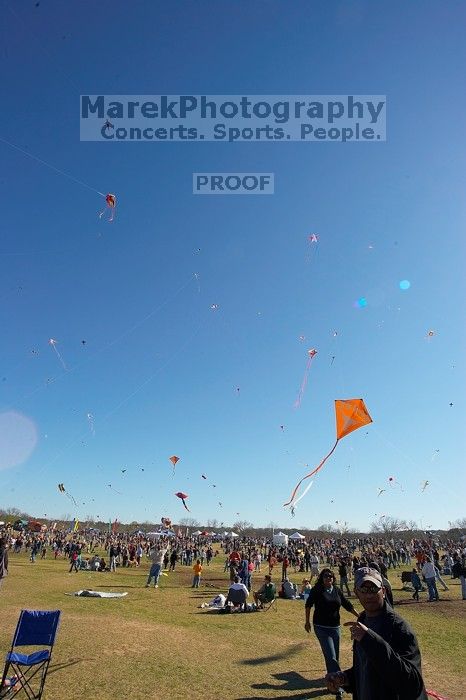 Madhav Tadikonda, class of 1997, and Anjali Patel, class of 1999, fly a UT kite at the 79th annual Zilker Park Kite Festival, Sunday, March 4, 2007.

Filename: SRM_20070304_1540389.jpg
Aperture: f/11.0
Shutter Speed: 1/250
Body: Canon EOS-1D Mark II
Lens: Sigma 15-30mm f/3.5-4.5 EX Aspherical DG DF