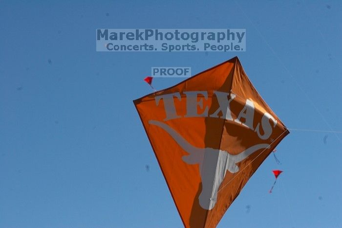 UT kites at the 79th annual Zilker Park Kite Festival, Sunday, March 4, 2007.

Filename: SRM_20070304_1541106.jpg
Aperture: f/14.0
Shutter Speed: 1/500
Body: Canon EOS 20D
Lens: Canon EF 80-200mm f/2.8 L