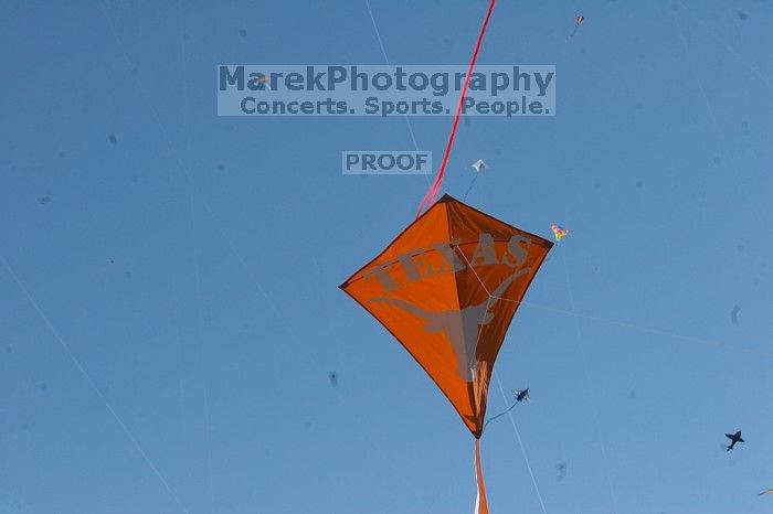 UT kites at the 79th annual Zilker Park Kite Festival, Sunday, March 4, 2007.

Filename: SRM_20070304_1541148.jpg
Aperture: f/14.0
Shutter Speed: 1/500
Body: Canon EOS 20D
Lens: Canon EF 80-200mm f/2.8 L
