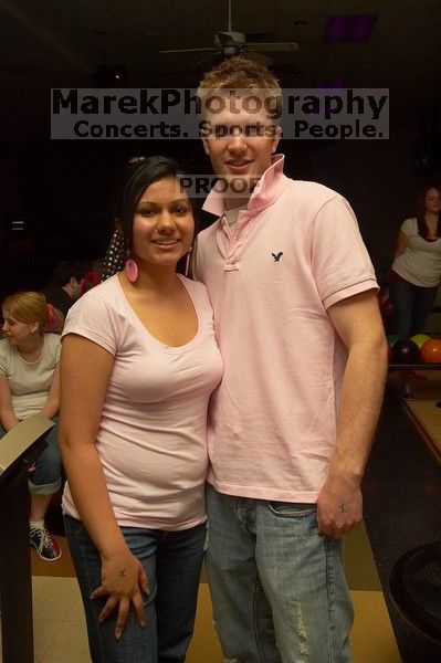 David Barlow and Alina Rizbia.  Alpha Xi Delta held a sock hop themed date night at the Austin 300 bowling alley, Thursday night, March 29, 2007.

Filename: SRM_20070329_2030188.jpg
Aperture: f/8.0
Shutter Speed: 1/200
Body: Canon EOS-1D Mark II
Lens: Sigma 15-30mm f/3.5-4.5 EX Aspherical DG DF