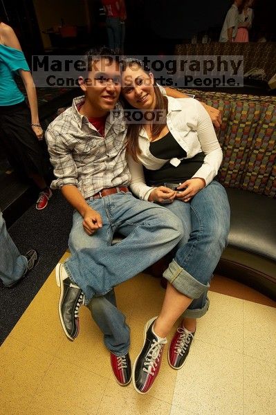 Allison Lear and Bobby Lopez.  Alpha Xi Delta held a sock hop themed date night at the Austin 300 bowling alley, Thursday night, March 29, 2007.

Filename: SRM_20070329_2040283.jpg
Aperture: f/8.0
Shutter Speed: 1/200
Body: Canon EOS-1D Mark II
Lens: Sigma 15-30mm f/3.5-4.5 EX Aspherical DG DF