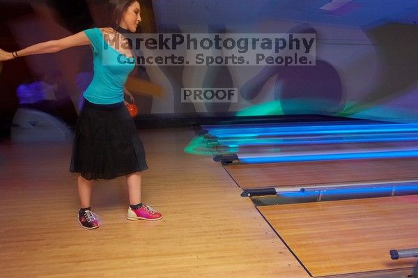 Erika Canales.  Alpha Xi Delta held a sock hop themed date night at the Austin 300 bowling alley, Thursday night, March 29, 2007.

Filename: SRM_20070329_2115569.jpg
Aperture: f/5.6
Shutter Speed: 1/1
Body: Canon EOS-1D Mark II
Lens: Sigma 15-30mm f/3.5-4.5 EX Aspherical DG DF