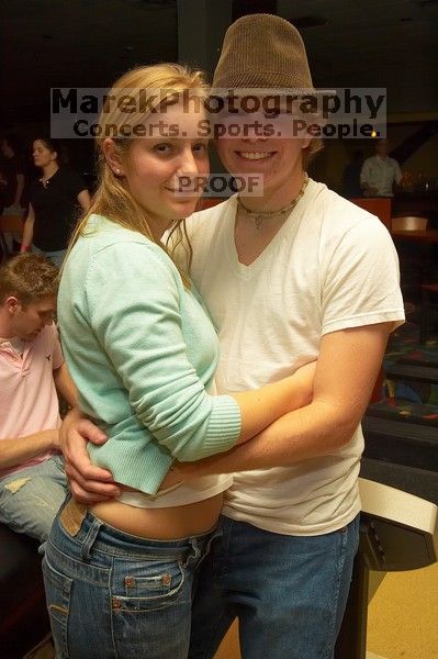 Alice Aertker and Daniel Holmes.  Alpha Xi Delta held a sock hop themed date night at the Austin 300 bowling alley, Thursday night, March 29, 2007.

Filename: SRM_20070329_2122468.jpg
Aperture: f/8.0
Shutter Speed: 1/250
Body: Canon EOS-1D Mark II
Lens: Sigma 15-30mm f/3.5-4.5 EX Aspherical DG DF