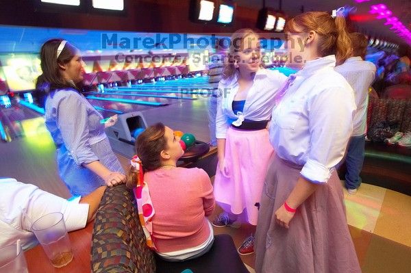 Carol Gossett, Amanda Young.  Alpha Xi Delta held a sock hop themed date night at the Austin 300 bowling alley, Thursday night, March 29, 2007.

Filename: SRM_20070329_2124140.jpg
Aperture: f/8.0
Shutter Speed: 1/1
Body: Canon EOS-1D Mark II
Lens: Sigma 15-30mm f/3.5-4.5 EX Aspherical DG DF