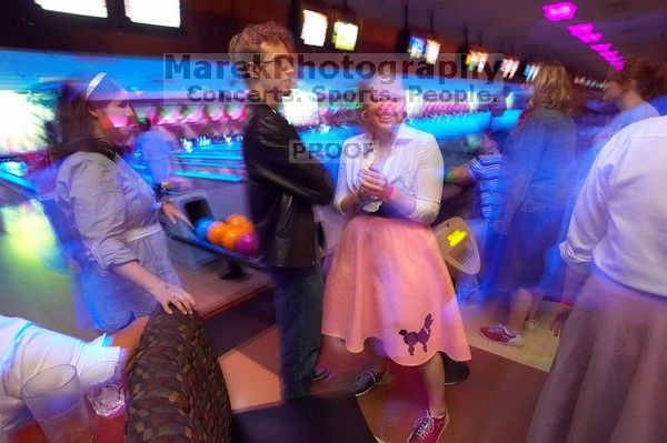 Carol Gossett, Amanda Young.  Alpha Xi Delta held a sock hop themed date night at the Austin 300 bowling alley, Thursday night, March 29, 2007.

Filename: SRM_20070329_2124344.jpg
Aperture: f/8.0
Shutter Speed: 1/1
Body: Canon EOS-1D Mark II
Lens: Sigma 15-30mm f/3.5-4.5 EX Aspherical DG DF