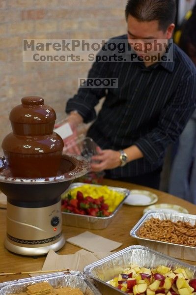 The Asian Business Students Association (ABSA) hosted a chocolate fondue Friday, January 26, 2007 before heading off to a movie premier.

Filename: SRM_20070126_1637244.jpg
Aperture: f/2.2
Shutter Speed: 1/50
Body: Canon EOS-1D Mark II
Lens: Canon EF 50mm f/1.8 II