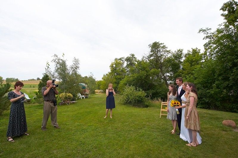 Kelly Kiefer's and John Saalwachter's wedding.

Filename: SRM_20070729_1754428.jpg
Aperture: f/6.3
Shutter Speed: 1/640
Body: Canon EOS-1D Mark II
Lens: Sigma 15-30mm f/3.5-4.5 EX Aspherical DG DF