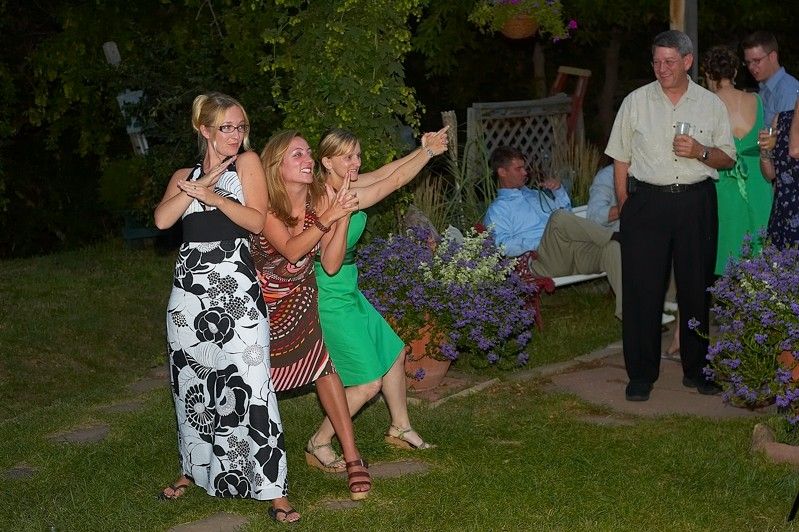 Kelly Kiefer's and John Saalwachter's wedding.

Filename: SRM_20070729_2050026.jpg
Aperture: f/4.0
Shutter Speed: 1/250
Body: Canon EOS-1D Mark II
Lens: Canon EF 50mm f/1.8 II