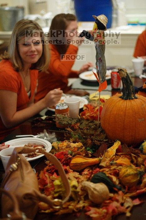 Rachel Upshaw, left, and Keaton Benn.  Kappa Kappa Gamma (KKG) hosted a parents' weekend barbecue before the UT vs Nebraska football game on Saturday, October 27, 2007 at their sorority house.

Filename: SRM_20071027_1147161.jpg
Aperture: f/1.8
Shutter Speed: 1/60
Body: Canon EOS-1D Mark II
Lens: Canon EF 50mm f/1.8 II
