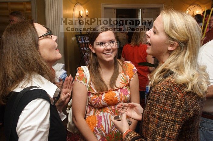 Laura Fowler, far right, with Georgia Dealey and her mother.  Kappa Kappa Gamma (KKG) hosted a parents' weekend barbecue before the UT vs Nebraska football game on Saturday, October 27, 2007 at their sorority house.

Filename: SRM_20071027_1230484.jpg
Aperture: f/8.0
Shutter Speed: 1/30
Body: Canon EOS 20D
Lens: Canon EF-S 18-55mm f/3.5-5.6