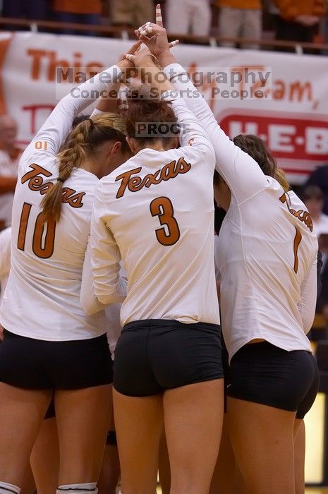 UT sophomore Ashley Engle (#10, S/RS), UT junior Lauren Paolini (#3, UTIL), and UT freshman Juliann Faucette (#1, OH) before the game.  The Longhorns defeated the Huskers 3-0 on Wednesday night, October 24, 2007 at Gregory Gym.

Filename: SRM_20071024_1836169.jpg
Aperture: f/4.5
Shutter Speed: 1/200
Body: Canon EOS-1D Mark II
Lens: Canon EF 80-200mm f/2.8 L