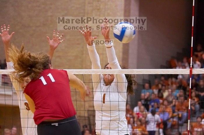 UT junior Lauren Paolini (#3, UTIL) and UT freshman Juliann Faucette (#1, OH) miss a block on Nebraska senior Tracy Stalls (#11, MB).  The Longhorns defeated the Huskers 3-0 on Wednesday night, October 24, 2007 at Gregory Gym.

Filename: SRM_20071024_1933263.jpg
Aperture: f/4.0
Shutter Speed: 1/320
Body: Canon EOS-1D Mark II
Lens: Canon EF 80-200mm f/2.8 L