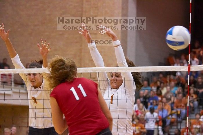 UT junior Lauren Paolini (#3, UTIL) and UT freshman Juliann Faucette (#1, OH) miss a block on Nebraska senior Tracy Stalls (#11, MB).  The Longhorns defeated the Huskers 3-0 on Wednesday night, October 24, 2007 at Gregory Gym.

Filename: SRM_20071024_1933284.jpg
Aperture: f/4.0
Shutter Speed: 1/320
Body: Canon EOS-1D Mark II
Lens: Canon EF 80-200mm f/2.8 L