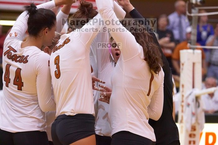 UT senior Brandy Magee (#44, MB), UT junior Lauren Paolini (#3, UTIL), UT sophomore Ashley Engle (#10, S/RS), UT freshman Juliann Faucette (#1, OH) and UT senior Alyson Jennings (#16, L) prepare for the third game.  The Longhorns defeated the Huskers 3-0 o

Filename: SRM_20071024_1948266.jpg
Aperture: f/4.0
Shutter Speed: 1/320
Body: Canon EOS-1D Mark II
Lens: Canon EF 80-200mm f/2.8 L