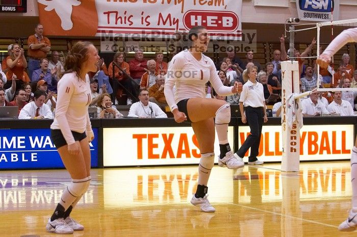 UT junior Kiley Hall (#11, DS/L) and UT freshman Juliann Faucette (#1, OH) are ecstatic after a point.  The Longhorns defeated the Huskers 3-0 on Wednesday night, October 24, 2007 at Gregory Gym.

Filename: SRM_20071024_1954500.jpg
Aperture: f/4.0
Shutter Speed: 1/400
Body: Canon EOS-1D Mark II
Lens: Canon EF 80-200mm f/2.8 L