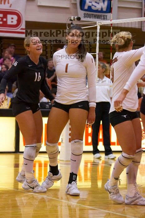 UT senior Alyson Jennings (#16, L), UT freshman Juliann Faucette (#1, OH) and UT sophomore Heather Kisner (#19, DS) celebrate after a point.  The Longhorns defeated the Huskers 3-0 on Wednesday night, October 24, 2007 at Gregory Gym.

Filename: SRM_20071024_2010429.jpg
Aperture: f/4.0
Shutter Speed: 1/400
Body: Canon EOS-1D Mark II
Lens: Canon EF 80-200mm f/2.8 L