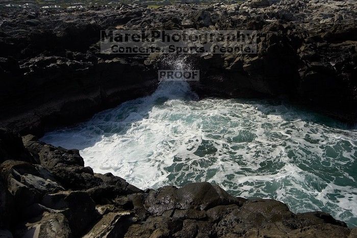 Hike to the Nakalele blowholes along the surf-beaten lava formations.

Filename: SRM_20071219_1224475.jpg
Aperture: f/8.0
Shutter Speed: 1/4000
Body: Canon EOS-1D Mark II
Lens: Sigma 15-30mm f/3.5-4.5 EX Aspherical DG DF