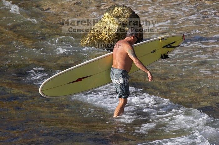 Surfers in Honolua Bay, Maui, Hawai'i, 2007.

Filename: SRM_20071217_1613465.jpg
Aperture: f/5.6
Shutter Speed: 1/2000
Body: Canon EOS 20D
Lens: Canon EF 300mm f/2.8 L IS