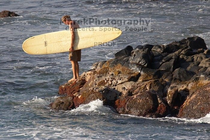 Surfers in Honolua Bay, Maui, Hawai'i, 2007.

Filename: SRM_20071217_1620211.jpg
Aperture: f/5.6
Shutter Speed: 1/1600
Body: Canon EOS 20D
Lens: Canon EF 300mm f/2.8 L IS