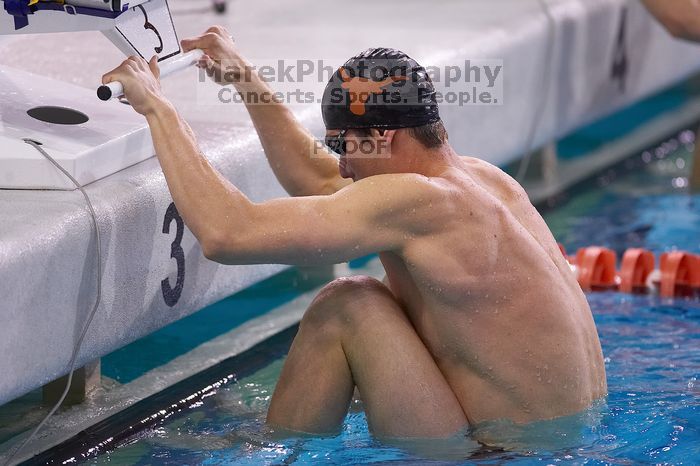 UT senior Daniel Rohleder took first in the 100 yard backstroke with a time of 9:11.44.  The University of Texas Longhorns defeated The University of Georgia Bulldogs 157-135 on Saturday, January 12, 2008.

Filename: SRM_20080112_1122248.jpg
Aperture: f/2.8
Shutter Speed: 1/400
Body: Canon EOS-1D Mark II
Lens: Canon EF 300mm f/2.8 L IS