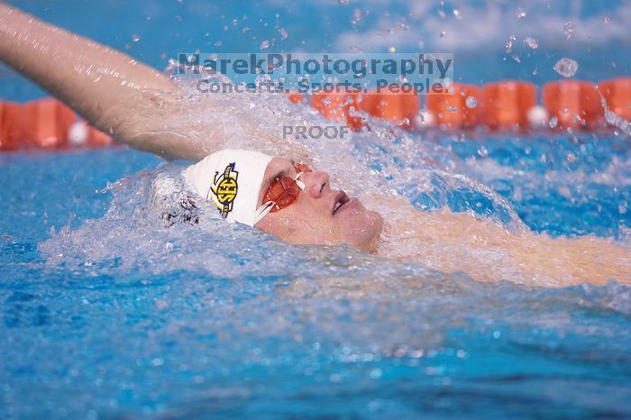 Georgia's Mark Dylla took third in the 200 yard backstroke with a time of 1:50.96.  The University of Texas Longhorns defeated The University of Georgia Bulldogs 157-135 on Saturday, January 12, 2008.

Filename: SRM_20080112_1159248.jpg
Aperture: f/2.8
Shutter Speed: 1/400
Body: Canon EOS-1D Mark II
Lens: Canon EF 300mm f/2.8 L IS