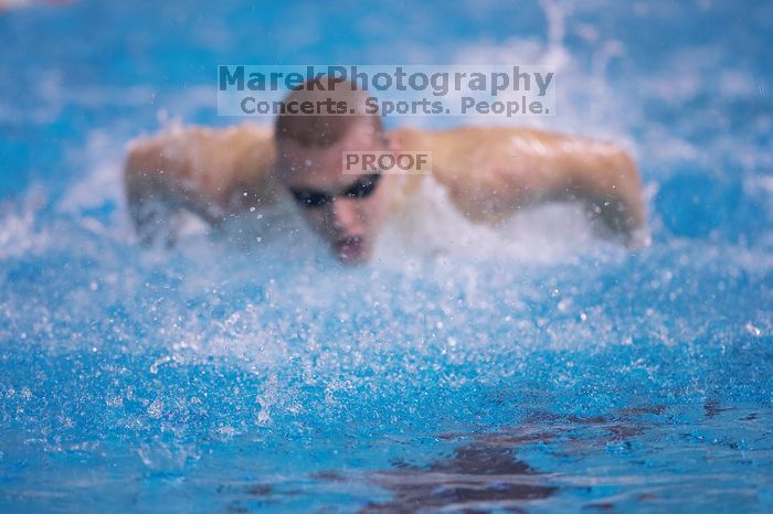 Georgia's Troyden Prinsloo took second in the 1000 yard freestyle with a time of 9:11.44.  The University of Texas Longhorns defeated The University of Georgia Bulldogs 157-135 on Saturday, January 12, 2008.

Filename: SRM_20080112_1210123.jpg
Aperture: f/2.8
Shutter Speed: 1/400
Body: Canon EOS-1D Mark II
Lens: Canon EF 300mm f/2.8 L IS