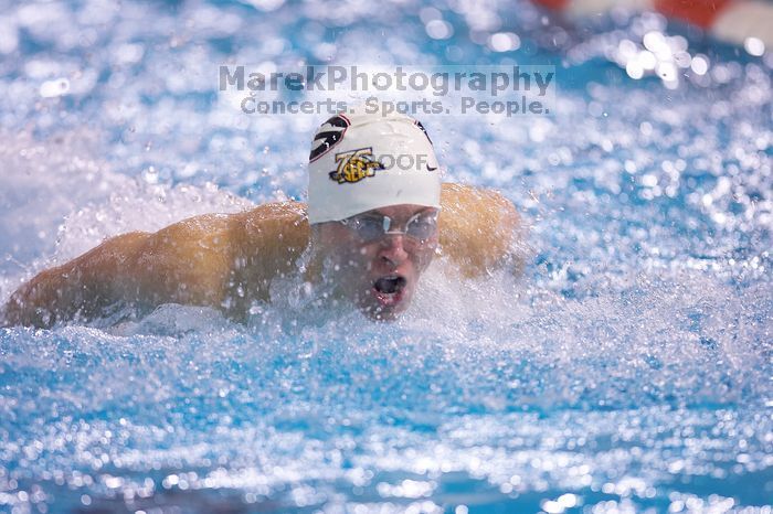 Georgia's James Lavender, the 100 yard breaststroke with a time of 53.02.  The University of Texas Longhorns defeated The University of Georgia Bulldogs 157-135 on Saturday, January 12, 2008.

Filename: SRM_20080112_1210209.jpg
Aperture: f/2.8
Shutter Speed: 1/400
Body: Canon EOS-1D Mark II
Lens: Canon EF 300mm f/2.8 L IS