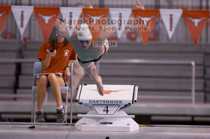Georgia's Gil Stovall took first in the 100 yard butterfly with a time of 49.01.  The University of Texas Longhorns defeated The University of Georgia Bulldogs 157-135 on Saturday, January 12, 2008.

Filename: SRM_20080112_1211288.jpg
Aperture: f/2.8
Shutter Speed: 1/400
Body: Canon EOS-1D Mark II
Lens: Canon EF 300mm f/2.8 L IS