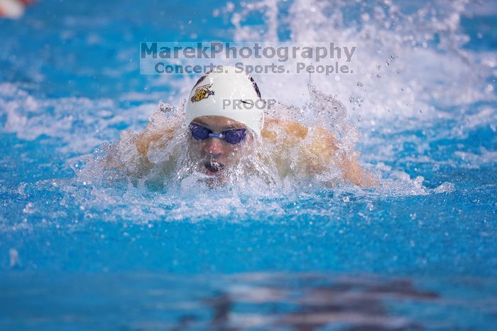 Georgia's Gil Stovall took first in the 100 yard butterfly with a time of 49.01.  The University of Texas Longhorns defeated The University of Georgia Bulldogs 157-135 on Saturday, January 12, 2008.

Filename: SRM_20080112_1212003.jpg
Aperture: f/2.8
Shutter Speed: 1/400
Body: Canon EOS-1D Mark II
Lens: Canon EF 300mm f/2.8 L IS