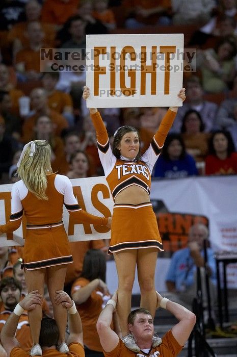 The University of Texas (UT) Longhorns defeated the University of Kansas Jayhawks 72-69 in Austin, Texas on Monday, February 11, 2008.

Filename: SRM_20080211_2052208.jpg
Aperture: f/2.8
Shutter Speed: 1/640
Body: Canon EOS 20D
Lens: Canon EF 300mm f/2.8 L IS