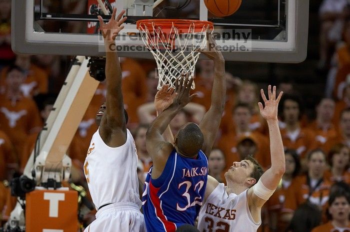 The University of Texas (UT) Longhorns defeated the University of Kansas Jayhawks 72-69 in Austin, Texas on Monday, February 11, 2008.

Filename: SRM_20080211_2118205.jpg
Aperture: f/2.8
Shutter Speed: 1/800
Body: Canon EOS 20D
Lens: Canon EF 300mm f/2.8 L IS