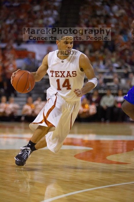 UT sophomore D.J. Augustin (#14, G) makes a drive.  The University of Texas (UT) Longhorns defeated the University of Kansas Jayhawks 72-69 in Austin, Texas on Monday, February 11, 2008.

Filename: SRM_20080211_2135065.jpg
Aperture: f/2.8
Shutter Speed: 1/640
Body: Canon EOS-1D Mark II
Lens: Canon EF 80-200mm f/2.8 L