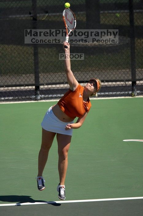 First doubles UT sophomore Vanja Corovic and UT junior Marija Milic defeated CSUS sophomore Aileen Tsan and CSUS junior Anastassia Lyssenko 8-3.  The University of Texas defeated Sacramento State on Saturday, March 22, 2008.

Filename: SRM_20080322_1112067.jpg
Aperture: f/4.0
Shutter Speed: 1/4000
Body: Canon EOS-1D Mark II
Lens: Canon EF 300mm f/2.8 L IS