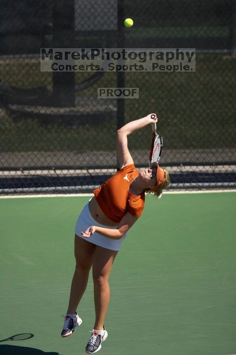 First doubles UT sophomore Vanja Corovic and UT junior Marija Milic defeated CSUS sophomore Aileen Tsan and CSUS junior Anastassia Lyssenko 8-3.  The University of Texas defeated Sacramento State on Saturday, March 22, 2008.

Filename: SRM_20080322_1112329.jpg
Aperture: f/4.0
Shutter Speed: 1/4000
Body: Canon EOS-1D Mark II
Lens: Canon EF 300mm f/2.8 L IS