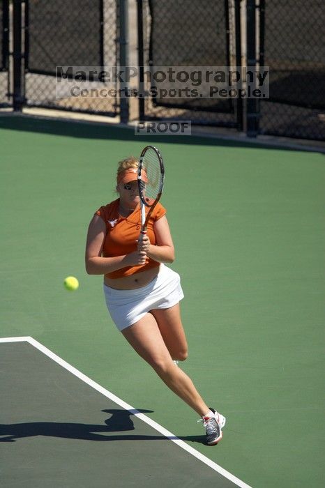 First doubles UT sophomore Vanja Corovic and UT junior Marija Milic defeated CSUS sophomore Aileen Tsan and CSUS junior Anastassia Lyssenko 8-3.  The University of Texas defeated Sacramento State on Saturday, March 22, 2008.

Filename: SRM_20080322_1112362.jpg
Aperture: f/4.0
Shutter Speed: 1/4000
Body: Canon EOS-1D Mark II
Lens: Canon EF 300mm f/2.8 L IS