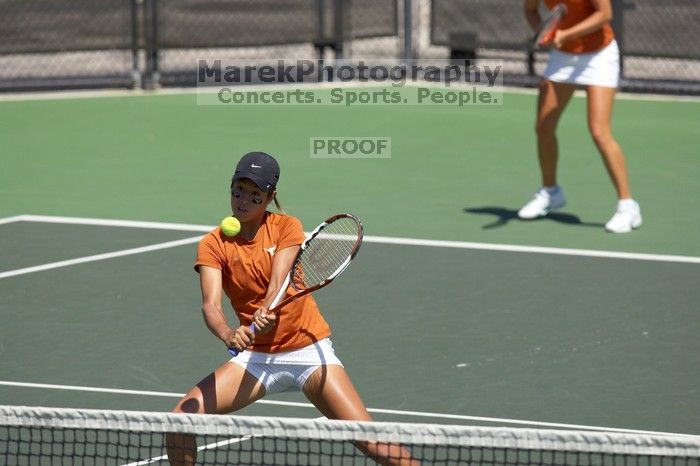 Third doubles UT sophomore Stephanie Davison and UT freshman Caroline Larsson defeated CSUS junior Joyce Martinez Gutierrez and CSUS freshman Melissa Valenzuela 8-6.  The University of Texas defeated Sacramento State on Saturday, March 22, 2008.

Filename: SRM_20080322_1121542.jpg
Aperture: f/4.0
Shutter Speed: 1/4000
Body: Canon EOS-1D Mark II
Lens: Canon EF 300mm f/2.8 L IS