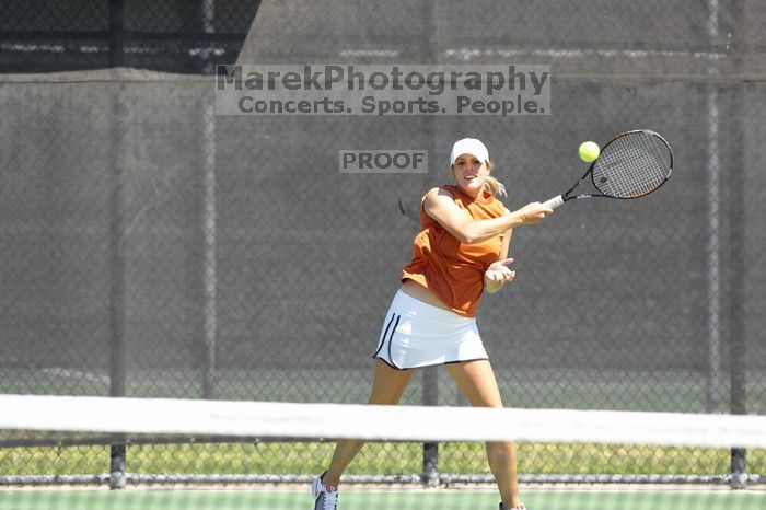 Second doubles UT freshman Maggie Mello and UT senior Courtney Zauft defeated CSUS junior Luba Schifris and CSUS junior Karina Jarlkaganova 8-4.  The University of Texas defeated Sacramento State on Saturday, March 22, 2008.

Filename: SRM_20080322_1143542.jpg
Aperture: f/4.0
Shutter Speed: 1/2000
Body: Canon EOS-1D Mark II
Lens: Canon EF 300mm f/2.8 L IS