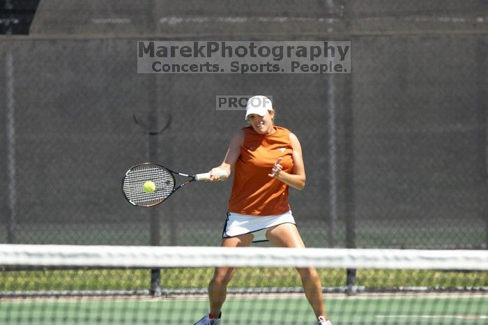 Second doubles UT freshman Maggie Mello and UT senior Courtney Zauft defeated CSUS junior Luba Schifris and CSUS junior Karina Jarlkaganova 8-4.  The University of Texas defeated Sacramento State on Saturday, March 22, 2008.

Filename: SRM_20080322_1149262.jpg
Aperture: f/4.0
Shutter Speed: 1/2500
Body: Canon EOS-1D Mark II
Lens: Canon EF 300mm f/2.8 L IS