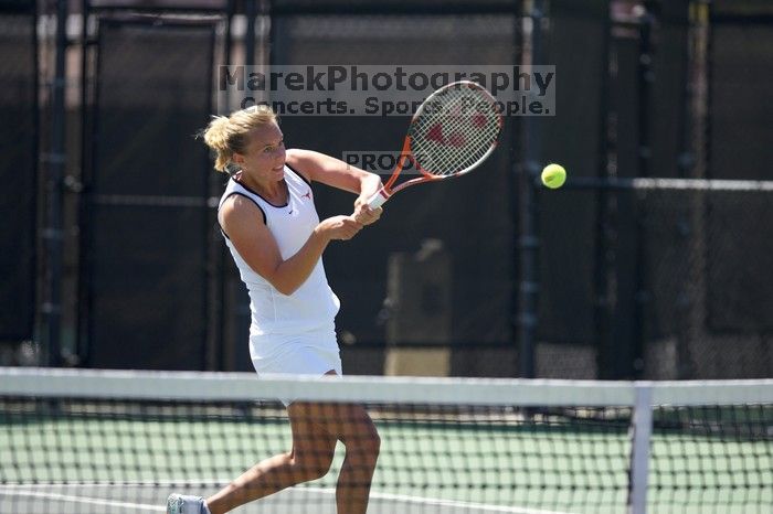 Fifth singles UT freshman Caroline Larsson defeated CSUS sophomore Aileen Tsan 6-2, 6-4.  The University of Texas defeated Sacramento State on Saturday, March 22, 2008.

Filename: SRM_20080322_1244006.jpg
Aperture: f/2.8
Shutter Speed: 1/2000
Body: Canon EOS-1D Mark II
Lens: Canon EF 300mm f/2.8 L IS