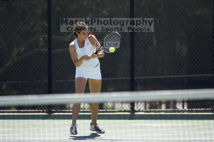 Fourth singles UT freshman Maggie Mello lost to CSUS junior Karina Jarlkaganova 6-7 (2), 4-6.  The University of Texas defeated Sacramento State on Saturday, March 22, 2008.

Filename: SRM_20080322_1245004.jpg
Aperture: f/2.8
Shutter Speed: 1/2000
Body: Canon EOS-1D Mark II
Lens: Canon EF 300mm f/2.8 L IS