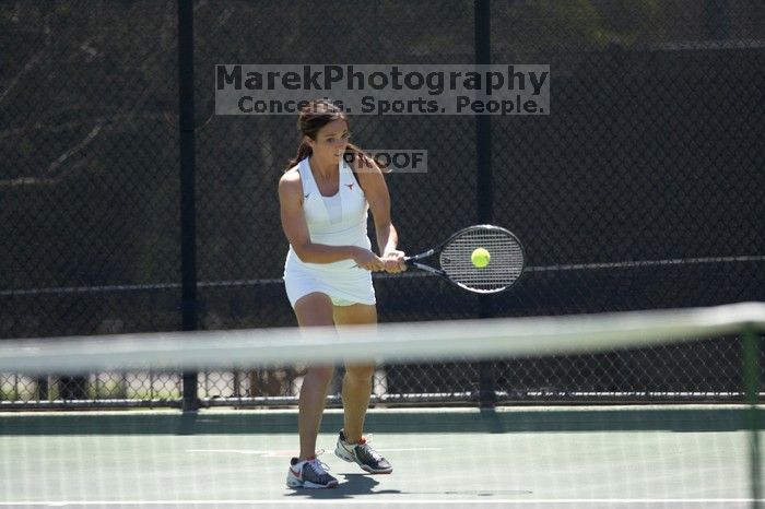 Fourth singles UT freshman Maggie Mello lost to CSUS junior Karina Jarlkaganova 6-7 (2), 4-6.  The University of Texas defeated Sacramento State on Saturday, March 22, 2008.

Filename: SRM_20080322_1245026.jpg
Aperture: f/2.8
Shutter Speed: 1/2000
Body: Canon EOS-1D Mark II
Lens: Canon EF 300mm f/2.8 L IS