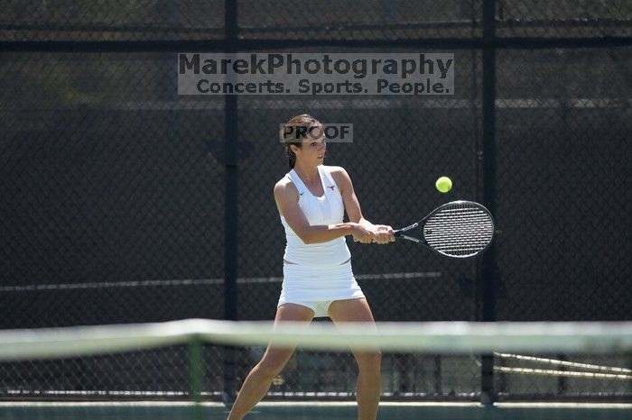 Fourth singles UT freshman Maggie Mello lost to CSUS junior Karina Jarlkaganova 6-7 (2), 4-6.  The University of Texas defeated Sacramento State on Saturday, March 22, 2008.

Filename: SRM_20080322_1245447.jpg
Aperture: f/2.8
Shutter Speed: 1/2000
Body: Canon EOS-1D Mark II
Lens: Canon EF 300mm f/2.8 L IS