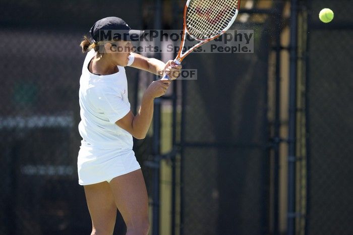 Third singles UT sophomore Stephanie Davison defeated CSUS junior Luba Schifris 7-5, 5-7, 16-14.  The University of Texas defeated Sacramento State on Saturday, March 22, 2008.

Filename: SRM_20080322_1319063.jpg
Aperture: f/2.8
Shutter Speed: 1/2500
Body: Canon EOS-1D Mark II
Lens: Canon EF 300mm f/2.8 L IS