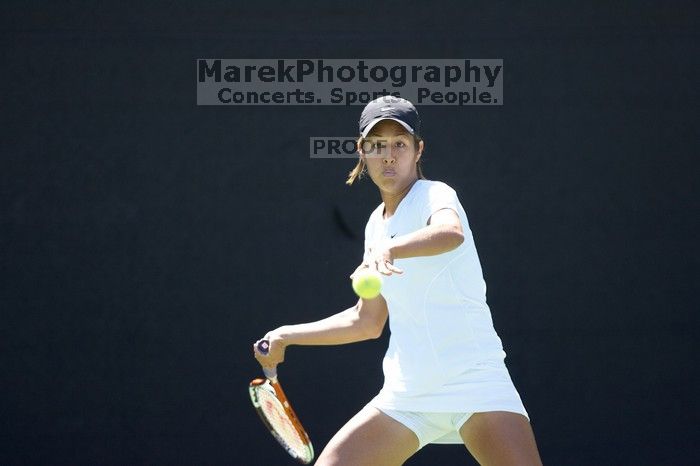 Third singles UT sophomore Stephanie Davison defeated CSUS junior Luba Schifris 7-5, 5-7, 16-14.  The University of Texas defeated Sacramento State on Saturday, March 22, 2008.

Filename: SRM_20080322_1323041.jpg
Aperture: f/2.8
Shutter Speed: 1/2000
Body: Canon EOS-1D Mark II
Lens: Canon EF 300mm f/2.8 L IS