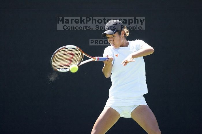 Third singles UT sophomore Stephanie Davison defeated CSUS junior Luba Schifris 7-5, 5-7, 16-14.  The University of Texas defeated Sacramento State on Saturday, March 22, 2008.

Filename: SRM_20080322_1323042.jpg
Aperture: f/2.8
Shutter Speed: 1/2000
Body: Canon EOS-1D Mark II
Lens: Canon EF 300mm f/2.8 L IS