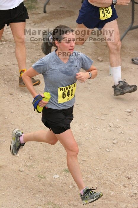 Beth Marek running The Saint trail race, sponsored by Rogue, at the Saint Stephen's Episcopal School on Sunday morning, June 29, 2008.

Filename: SRM_20080629_0731209.jpg
Aperture: f/4.0
Shutter Speed: 1/250
Body: Canon EOS 20D
Lens: Canon EF 80-200mm f/2.8 L