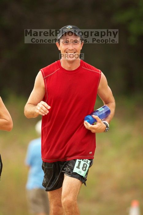 The Saint trail race, sponsored by Rogue, at the Saint Stephen's Episcopal School on Sunday morning, June 29, 2008.

Filename: SRM_20080629_0903009.jpg
Aperture: f/2.8
Shutter Speed: 1/1250
Body: Canon EOS 20D
Lens: Canon EF 300mm f/2.8 L IS